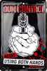 Gun Control Means Using Both Hands Embossed Metal Sign